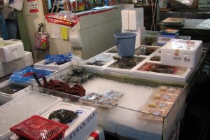 Seafood goods on display for buyers.