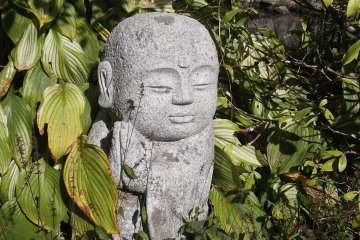 One of the little statues near the hall