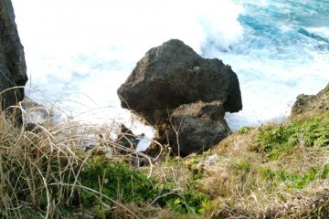 Waves Crash into the Cliffs at Cape Manza