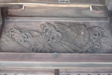 One of the wooden carvings