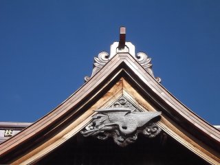 The carving under the roof
