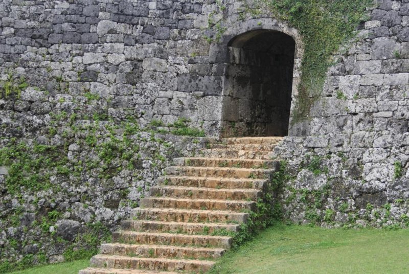 Coral steps lead to a stone archway between the lower and upper courts at Zakim Castle Ruins in Yomitan Okinawa.