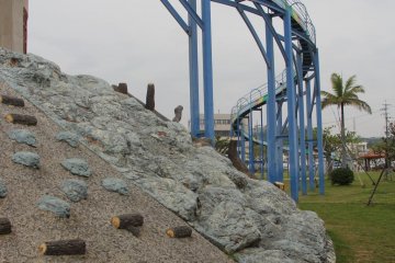 <p>The towering slide looks like a monorail track</p>