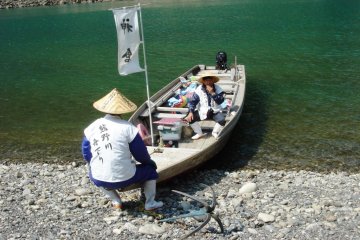 Short break on the shores of Kumano River before continuing the journey downriver towards the Hayatama Shrine