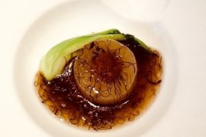 Scallop and bok choy in amber sauce.