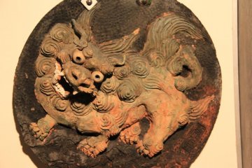 Shisa dogs can be placed on walls like this one found in the Gyokusendo Cave