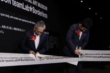 Ribbon cutting to mark the opening of teamLab Borderless.