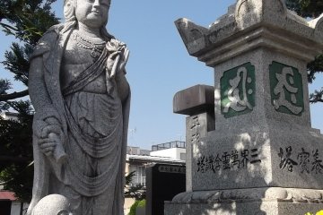 A Buddhist deity by the graveyard