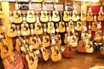 Inside Guitar Planet: wall to wall Martins.