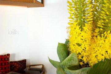 Beautiful flowers at the reception desk illuminates your dining experience