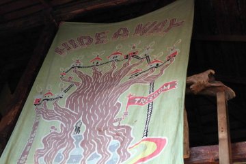 The large Hideaway flag covers the upper treehouse area. Climb up the ladder and get a view from the top.