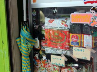 Authentic Thai fish sauce and noodle soups sit in the window.