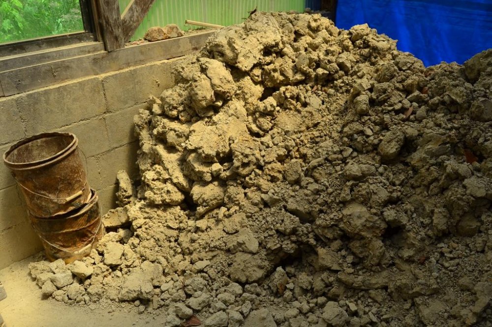 Excavated clay raw materials awaiting processing.