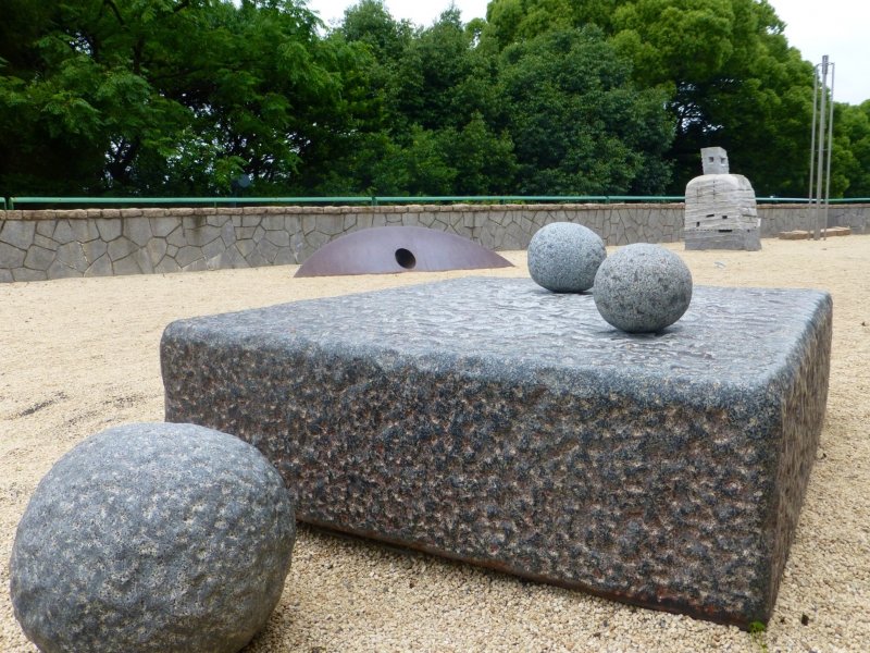 Makio Yamaguchi's 1988 sculpture invites visitors to move the smaller stones around and listen to the sound which follows