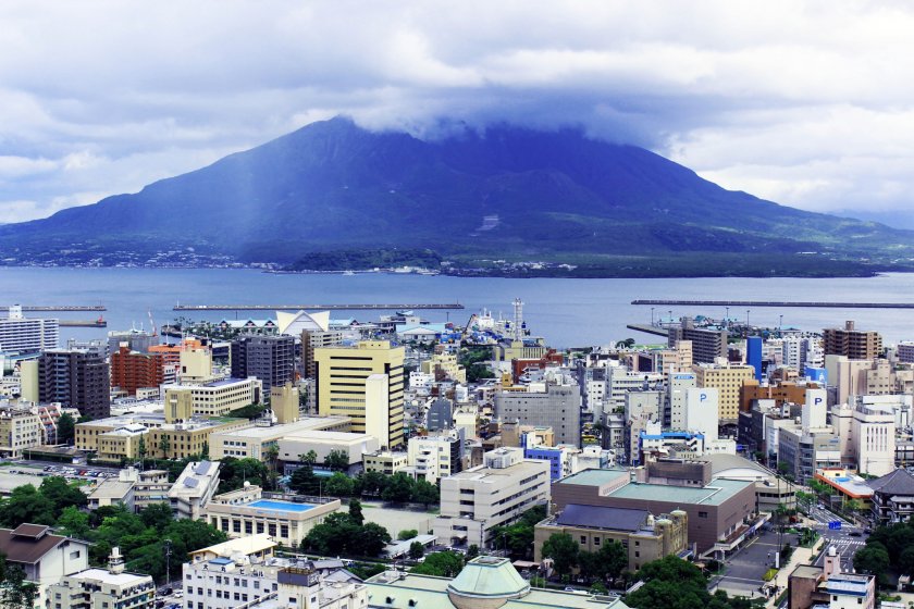 A cloudy day at Shiroyama Observatory. Here we see a view of downtown Kagoshima, Sakurajima volcano and Kinko Bay.