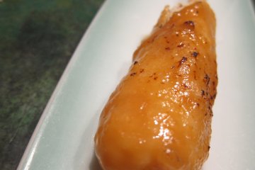 Yummy Kiritampo rice stick with miso at Mugendo Omachi Honten Akita City