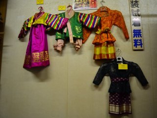 Traditional costumes of Korea and Indonesia.