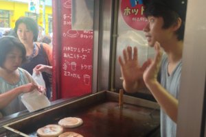 Korean staff chat with guests at Mr. Hottoku in Shin-Okubo