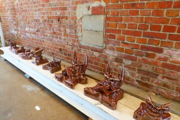 Ceramic figures soon to be placed on the brewery's roof - Gargoyles to ward off evil and pigeons invite happiness