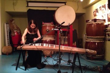 Koto Master, Masumi Timson. Her performance is enchanting and captivating; almost as if she weaves a little magic everytime she moves a finger on her beautiful koto. www.masumi-koto.com