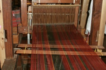 The warp is pulled tensely so that it's completely straight