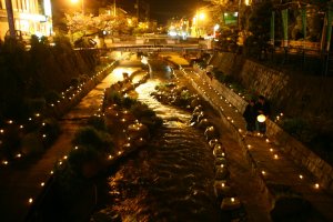 Night view of the beautiful river which runs through the hot spring town