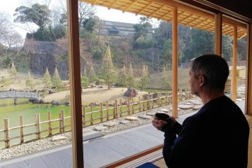 Experiencing a Japanese tea ritual at Kanazawa castle park.