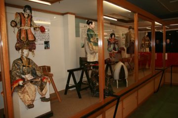 Various retired Karakuri Dolls on display