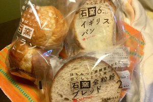 Takaki Bakery breads distinguish themselves in the bread aisle by their minimalist clear packaging through which you could see the high quality bread, and the words "石窯" which means "stone kiln".