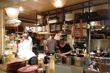 Chefs at work in the open kitchen at Mimasuya Restaurant at Pontocho by the Kamogawa