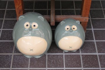 Two ceramic tanuki