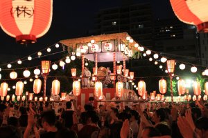 A yagura stage featuring taiko drummers