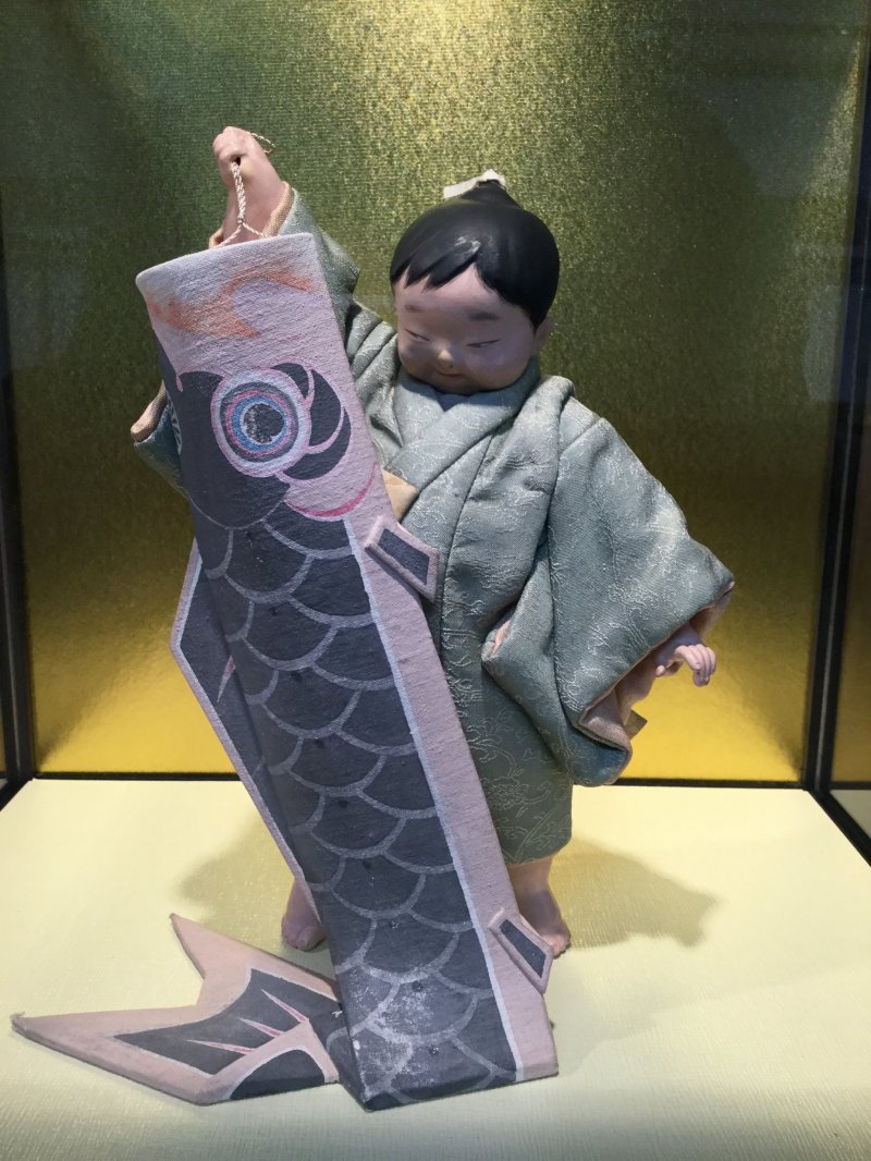 Dolls depicting ordinary people are also on display.
