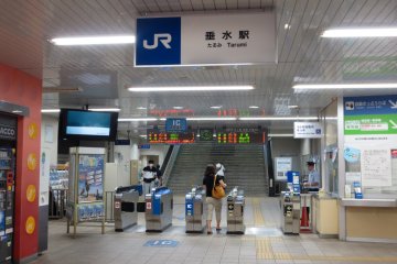 East ticketing gate at JR Tarumi Station with helpful station employees