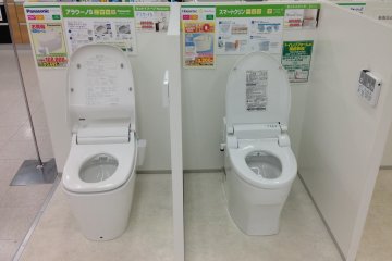 <p>Yamada sells add on bidet seat covers for toilets, and also entices customers with these top of the line high efficiency toilets with bidet seat and remote control for about 168,000 yen ($1,700 U.S.)</p>