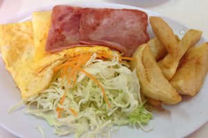 Ham and egg breakfast platter with salad