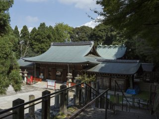 As you climb the first few steps towards the mountains, Gokoku shrine is just bellow you.