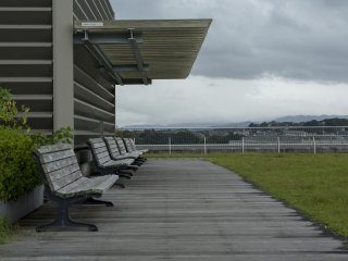 Benches can be enjoyed on a sunnier day but the rain isn't enough to ruin such a view