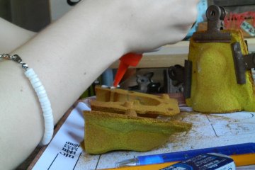 Gluing the two halves of the mould together.