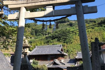 The Torii gate, the typical entrance to a Shinto shrine