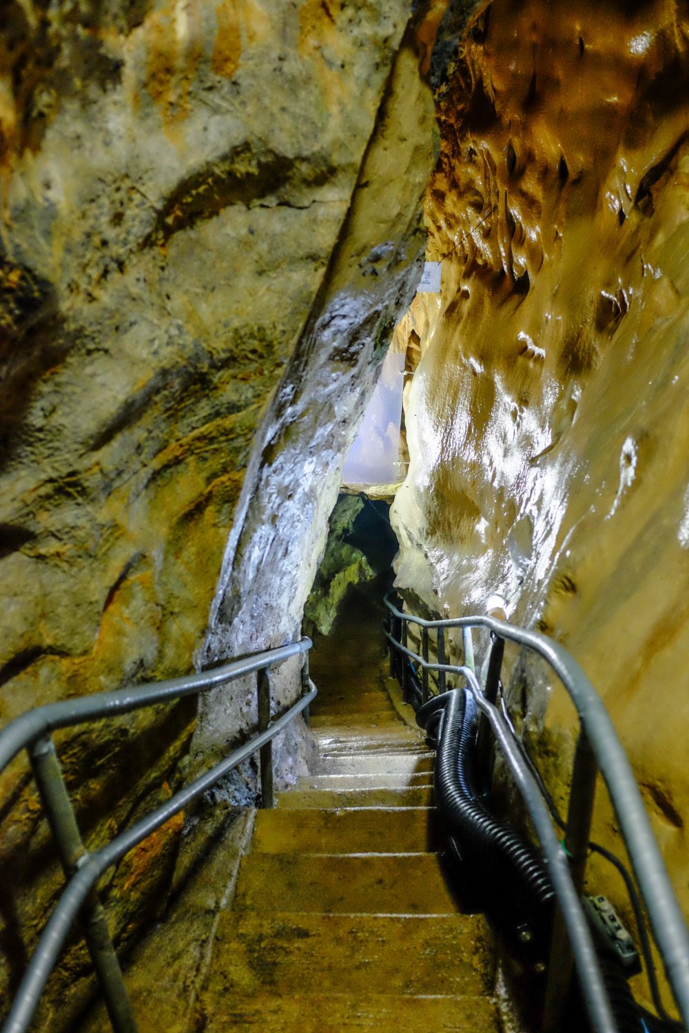 The cave features narrow walkways with low overhead clearance, giving it a nice and rustic feeling