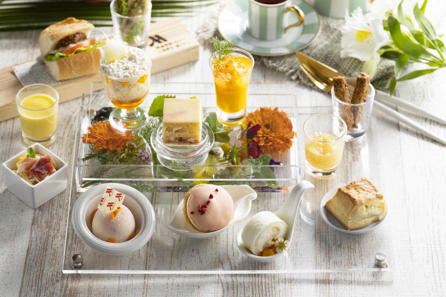 The afternoon tea menu incorporates the taste of summer via peach and mango dishes