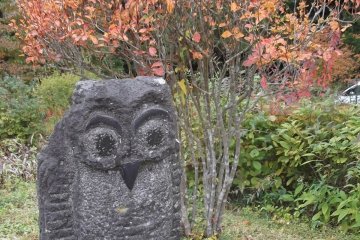 Another owl stationed in the garden
