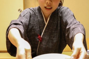 The Japanese waitress, nakai, will happily serve you food