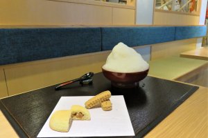 A Bukubuku afternoon tea set with Chinsuku, a traditional sweet made in Okinawa since the times of the Ryukyu Kingdom. It is a sweet shortbread made of mostly lard and flour with a unami like fragrance.