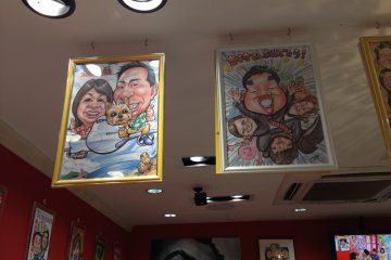 Some past drawings by the artist at Caricature Japan in Shibuya