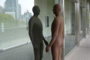 A statue admires himself at the Museum of Modern Art