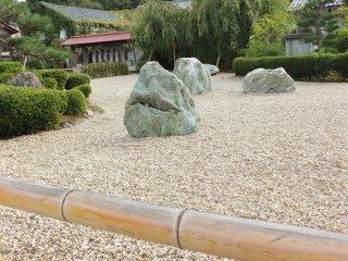 Rock garden and bamboo post