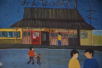 <p>ภาพวาดสถานียามาโมโต้ในห้องนั่งรอ</p>