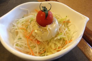 <p>A side cabbage and lettuce salad</p>